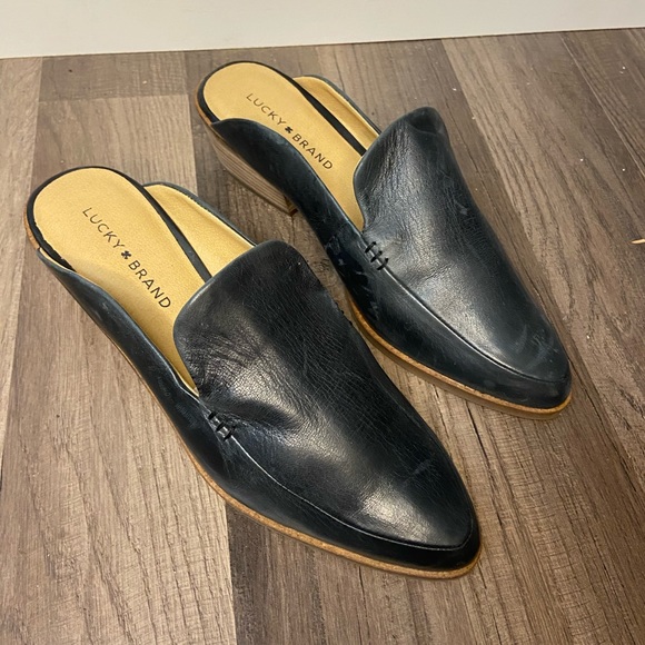 black leather mule slides